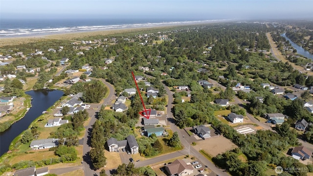 213 N Wynoochee Dr SW, Ocean Shores, WA 98569 - aerial overview of property's location with a nearby body of water and nearby suburban area