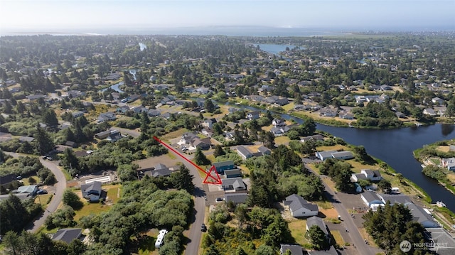 213 N Wynoochee Dr SW, Ocean Shores, WA 98569 - aerial view of property and surrounding area with a nearby body of water and nearby suburban area