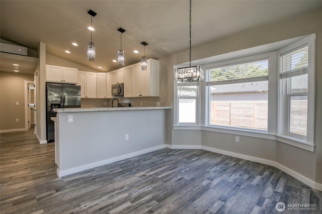 213 N Wynoochee Dr SW, Ocean Shores, WA 98569 - kitchen featuring black microwave, fridge with ice dispenser, white cabinetry, dark wood-style flooring, and recessed lighting