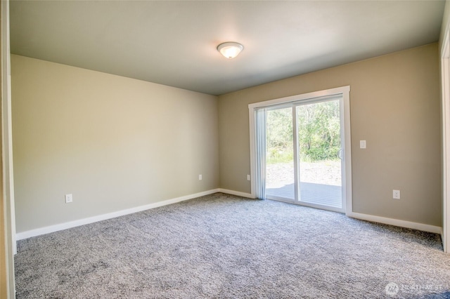 213 N Wynoochee Dr SW, Ocean Shores, WA 98569 - carpeted empty room with baseboards