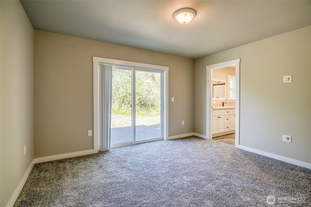 213 N Wynoochee Dr SW, Ocean Shores, WA 98569 - empty room featuring light colored carpet and baseboards