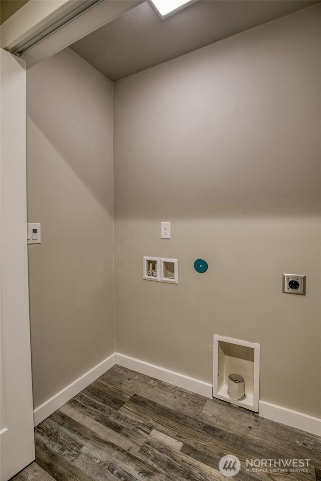213 N Wynoochee Dr SW, Ocean Shores, WA 98569 - laundry room featuring dark wood finished floors, hookup for an electric dryer, washer hookup, and baseboards