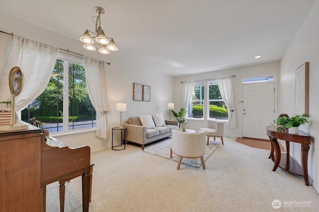 15204 48th Ave SE, Everett, WA 98208 - living area with carpet flooring and a chandelier
