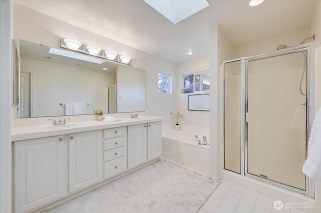 15204 48th Ave SE, Everett, WA 98208 - bathroom with a bath, a shower stall, a skylight, and double vanity