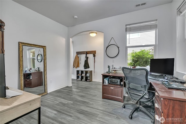 17712 17th Ave E, Spanaway, WA 98387 - office area featuring arched walkways and light wood-style flooring