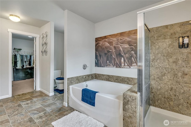 17712 17th Ave E, Spanaway, WA 98387 - full bath featuring a garden tub, a shower stall, and a walk in closet