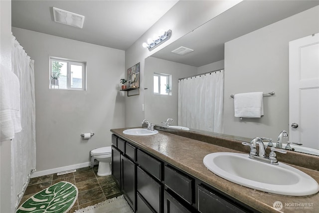 17712 17th Ave E, Spanaway, WA 98387 - bathroom with double vanity and a shower with curtain