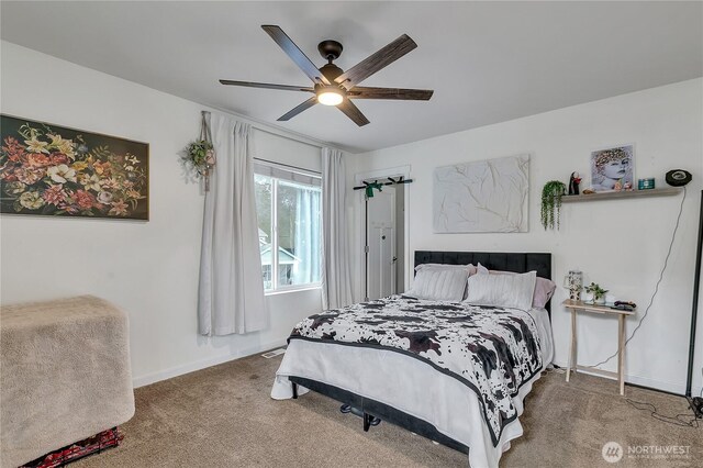 17712 17th Ave E, Spanaway, WA 98387 - carpeted bedroom featuring baseboards and a ceiling fan
