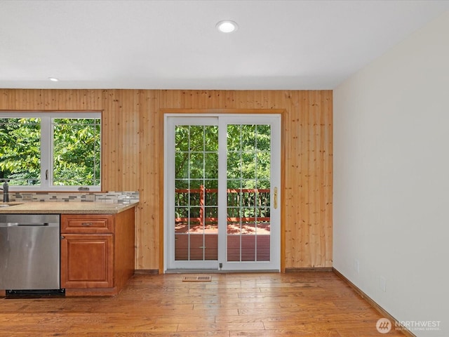 10122 50th Pl W, Mukilteo, WA 98275 - doorway to outside featuring light wood-style flooring, recessed lighting, and wooden walls