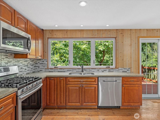 10122 50th Pl W, Mukilteo, WA 98275 - kitchen with appliances with stainless steel finishes, tasteful backsplash, light stone counters, and recessed lighting