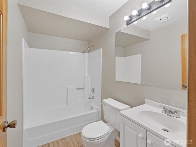 10122 50th Pl W, Mukilteo, WA 98275 - bathroom featuring vanity, shower / washtub combination, and wood finished floors