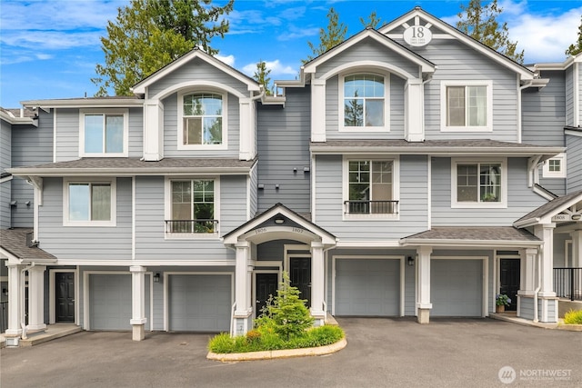16125 Juanita Woodinville Way NE Unit 1807, Bothell, WA 98011 - view of front of home with a garage and driveway