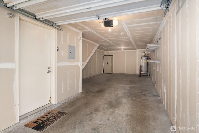 16125 Juanita Woodinville Way NE Unit 1807, Bothell, WA 98011 - garage with electric panel, a garage door opener, and strapped water heater