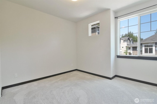 17723 3rd Ave SE, Bothell, WA 98012 - carpeted empty room featuring baseboards