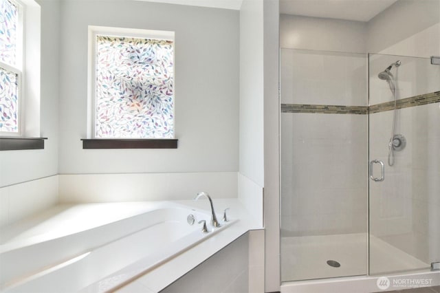 17723 3rd Ave SE, Bothell, WA 98012 - bathroom featuring a shower stall, healthy amount of natural light, and a bath