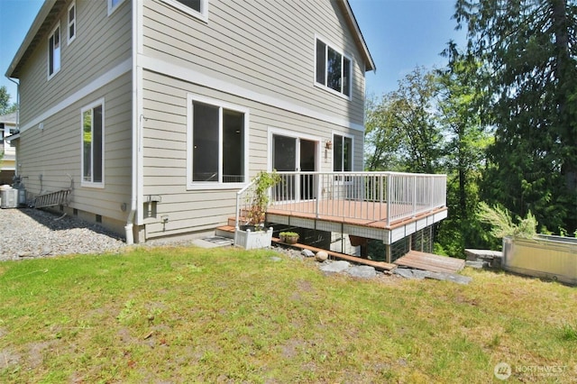 17723 3rd Ave SE, Bothell, WA 98012 - back of property with a wooden deck, a lawn, and crawl space