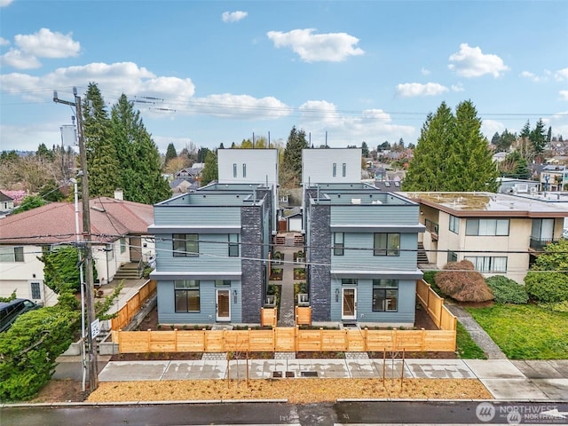 7741 15th Ave NE Unit C, Seattle, WA 98115 - contemporary home with a fenced front yard and a residential view