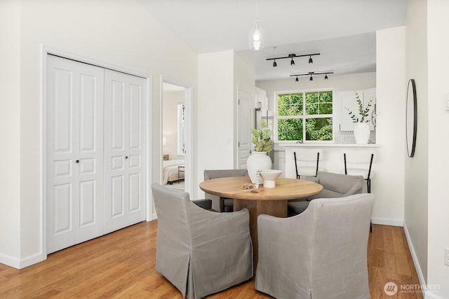 23420 SE Black Nugget Rd Unit E-302, Issaquah, WA 98029 - dining space with light wood finished floors and baseboards