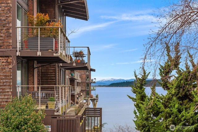 3717 Beach Dr SW Unit 113, Seattle, WA 98116 - water view with a mountain backdrop