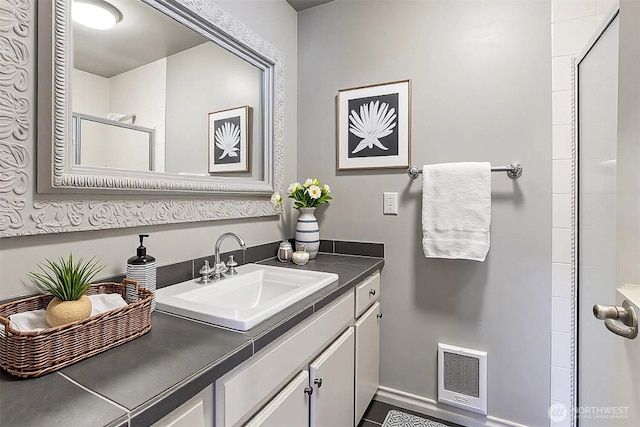 3717 Beach Dr SW Unit 113, Seattle, WA 98116 - full bathroom with vanity, a shower, and heating unit
