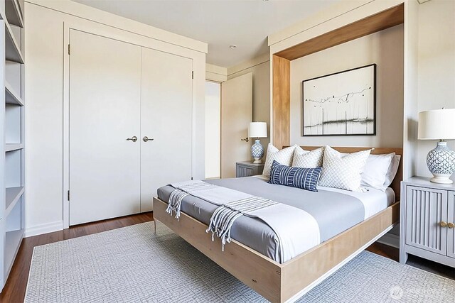 3717 Beach Dr SW Unit 113, Seattle, WA 98116 - bedroom featuring wood finished floors and a closet
