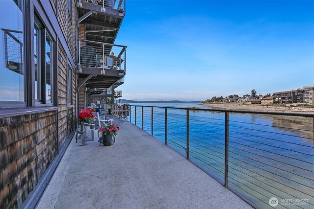 3717 Beach Dr SW Unit 113, Seattle, WA 98116 - balcony featuring a water view