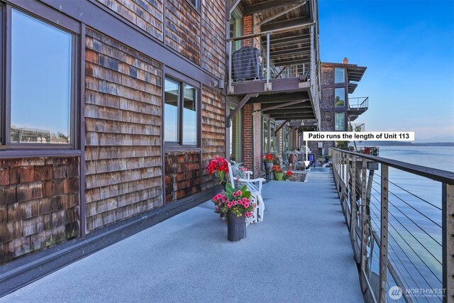 3717 Beach Dr SW Unit 113, Seattle, WA 98116 - patio / terrace featuring a water view
