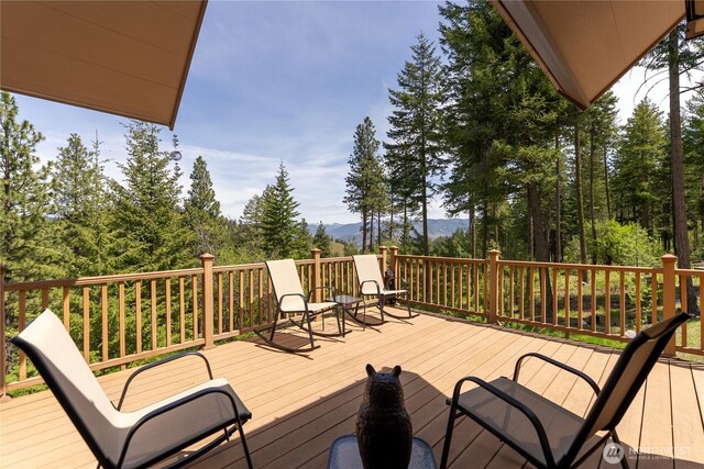 65 Fiddlers Rd, Winthrop, WA 98862 - wooden terrace with a mountain view