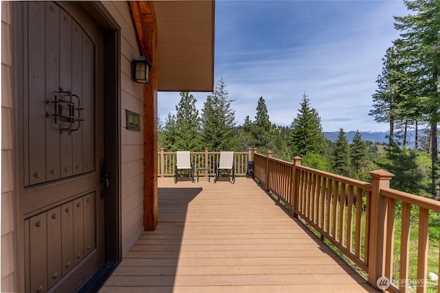 65 Fiddlers Rd, Winthrop, WA 98862 - wooden terrace with a wooded view