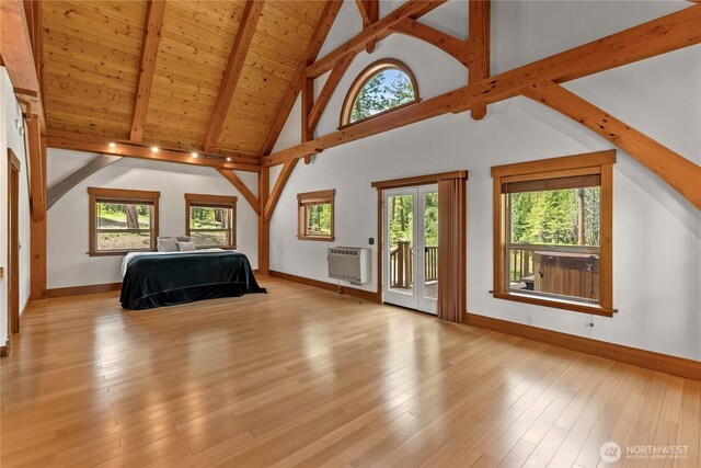 65 Fiddlers Rd, Winthrop, WA 98862 - unfurnished bedroom featuring beam ceiling, access to outside, heating unit, light wood-type flooring, and high vaulted ceiling