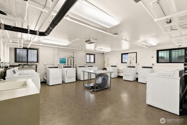 1105 Spring St Unit 1106, Seattle, WA 98104 - community laundry room with independent washer and dryer