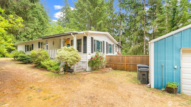 20 NE Wanda Ct, Belfair, WA 98528 - view of front facade with a porch