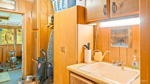20 NE Wanda Ct, Belfair, WA 98528 - bathroom featuring a sink and wooden walls