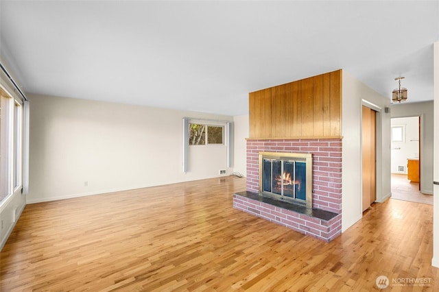 2834 Leeward Way, Bellingham, WA 98226 - unfurnished living room featuring light wood-style floors and a fireplace
