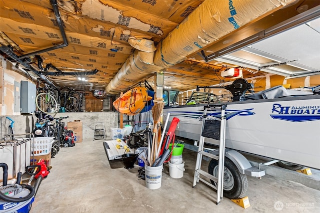 22023 11th Ave S, Des Moines, WA 98198 - garage featuring electric panel and a garage door opener