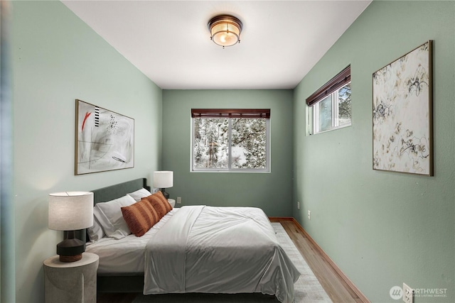 11358 River Bend Dr, Leavenworth, WA 98826 - bedroom featuring wood finished floors and baseboards