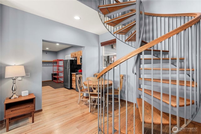 11358 River Bend Dr, Leavenworth, WA 98826 - stairs featuring wood finished floors and recessed lighting
