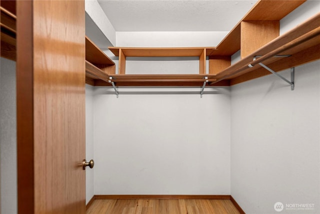 11358 River Bend Dr, Leavenworth, WA 98826 - walk in closet with wood finished floors