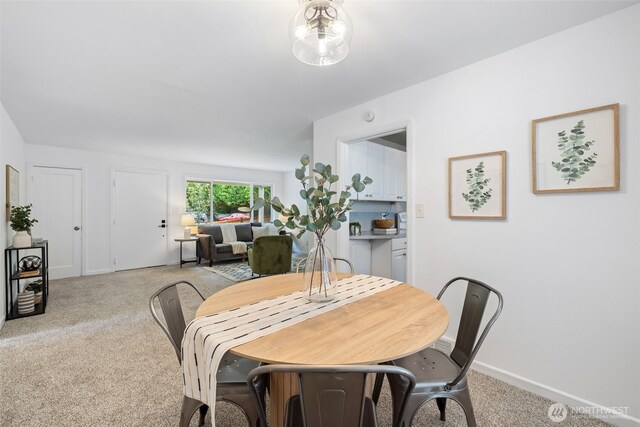 6017 Fauntleroy Way SW, Seattle, WA 98136 - dining space with carpet flooring