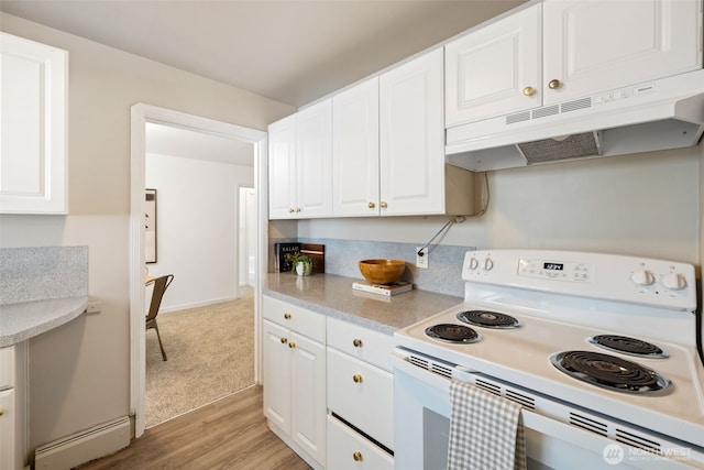6017 Fauntleroy Way SW, Seattle, WA 98136 - kitchen with white electric stove, under cabinet range hood, white cabinets, and light countertops