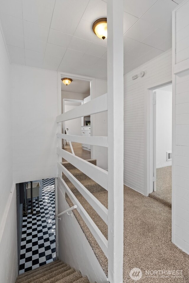 6017 Fauntleroy Way SW, Seattle, WA 98136 - stairway with carpet floors