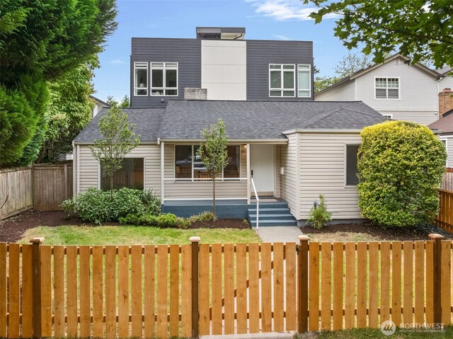6017 Fauntleroy Way SW, Seattle, WA 98136 - view of front of house featuring a porch, a fenced backyard, and roof with shingles