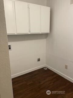 102 Garden Hill Rd, Elma, WA 98541 - washroom with cabinet space, dark wood-style flooring, and electric dryer hookup