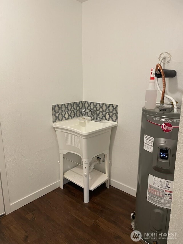 102 Garden Hill Rd, Elma, WA 98541 - detailed view of water heater and wood finished floors