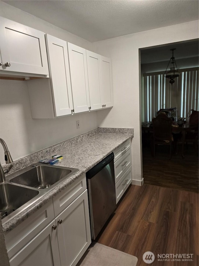 102 Garden Hill Rd, Elma, WA 98541 - kitchen featuring stainless steel dishwasher, dark wood-style flooring, white cabinetry, and light countertops