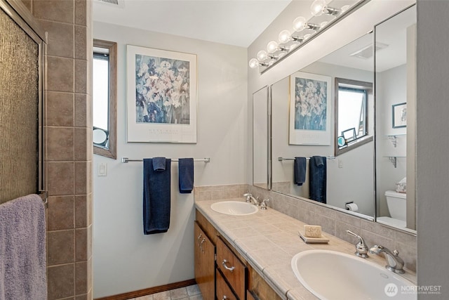 225 NE 19th St Unit 24, East Wenatchee, WA 98802 - bathroom with double vanity and a shower stall