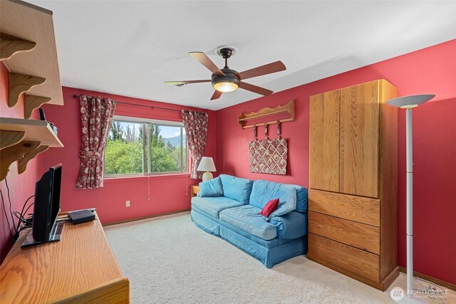 225 NE 19th St Unit 24, East Wenatchee, WA 98802 - carpeted living room featuring ceiling fan and baseboards