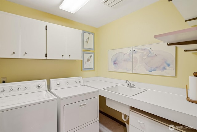 225 NE 19th St Unit 24, East Wenatchee, WA 98802 - washroom with cabinet space and washing machine and dryer