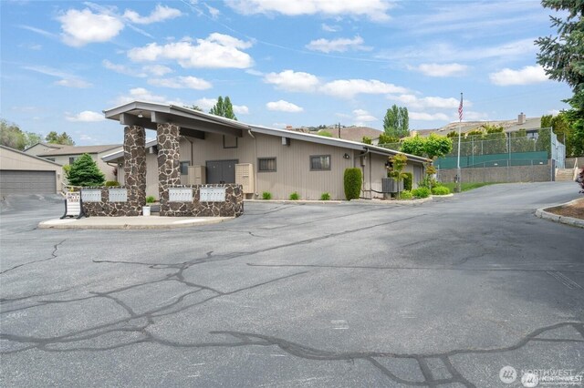 225 NE 19th St Unit 24, East Wenatchee, WA 98802 - view of front of house with stone siding