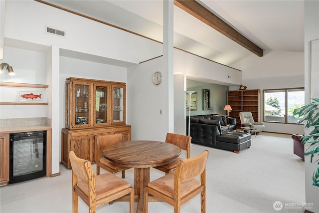 225 NE 19th St Unit 24, East Wenatchee, WA 98802 - dining area featuring wine cooler and light carpet